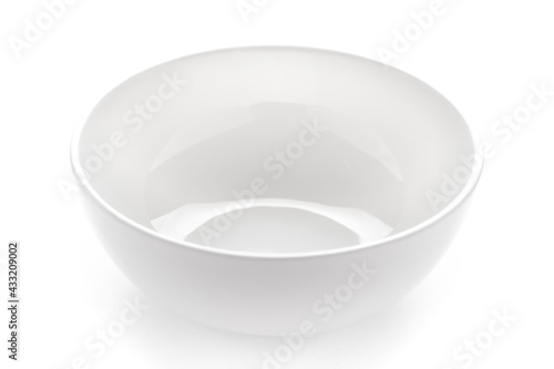 An empty ceramic white bowl for mockup. over white background