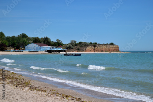 Serene seascape: fishing boat on the sea - Olimp, Mangalia, Constanta, Romania, Black Sea, Europe