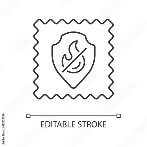 Fireproof fabric feature on fabric linear icon. Non inflammable fiber label. Textile industry. Thin line customizable illustration. Contour symbol. Vector isolated outline drawing. Editable stroke
