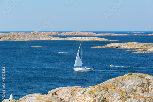 Sailboat in the rocky sea archipelago on the Swedish west coast