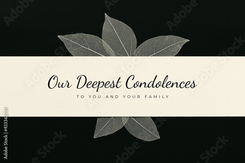 Our Deepest Condolences to you and your family. A sympathetic condolence card design for someone mourning the death. Black and white condolence card with text and leaves on the dark background.