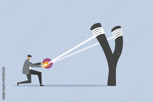 Illustration of a businessman aiming high with a big catapult