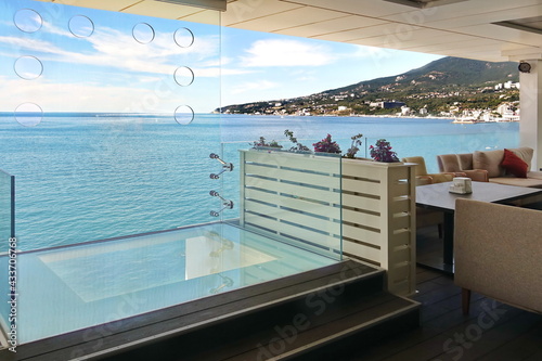 Modern Terrace With Panoramic Seaside View. Modern Interior Alfresco Restaurant Or Hotel Lounge Verandah With Seaview. Sea View Restaurant Modern Interior