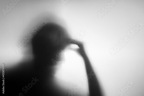 Conceptual Photo. Motion Blurred image. Silhouette of Senior Elderly Person who as Parkinson or Alzheimer Disease. Memory Loss from Dementia. Brain Function Decline