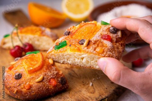 Coca de sant joan. Traditional San Juan cake to celebrate the arrival of summer in Spain made with brioche bread, candied fruit and nuts.