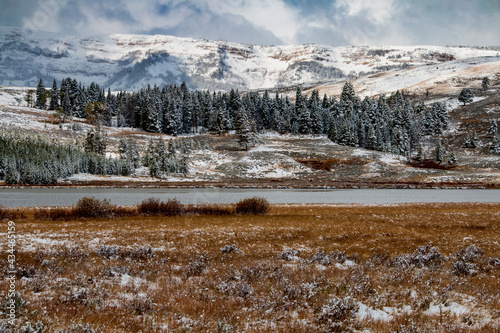 snow capped Gallatin mountain range in Yellowstone National park durung autumn.