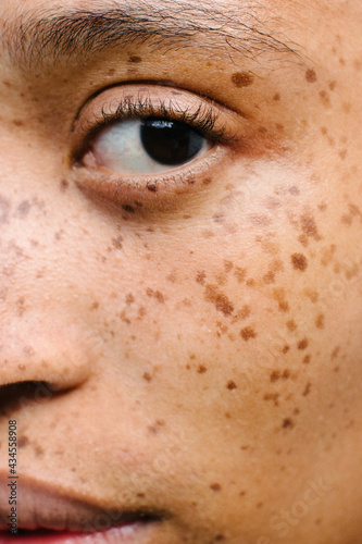 Close up portrait of girl with freckles