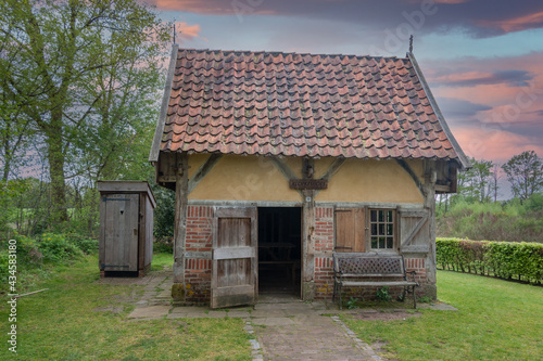 An old house with the name "klopkeshoes" This building was inhabited by unmarried women who went to the houses in the neighborhood to proclaim the faith, region Twente province Overijssel