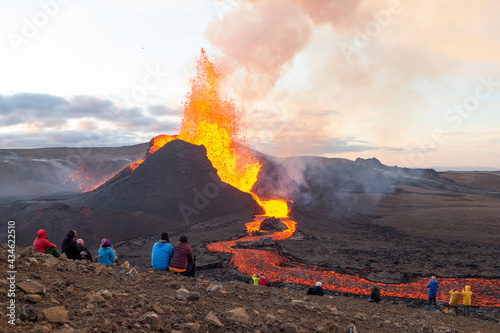 GELDINGADALIR, ICELAND - 11 MAY, 2021: A small volcanic eruption started at the Reykjanes peninsula. The event has attracted thousands of visitors who have braved a daring hike to the crater.