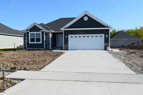 New Home Driveway Construction with a Concrete Cement Foundation by Builders for a Smooth Surface