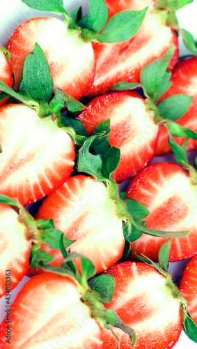 Background with Beautiful and Juicy Strawberries. Fresh Juicy Strawberries with Leaves. Summer Berries Background.