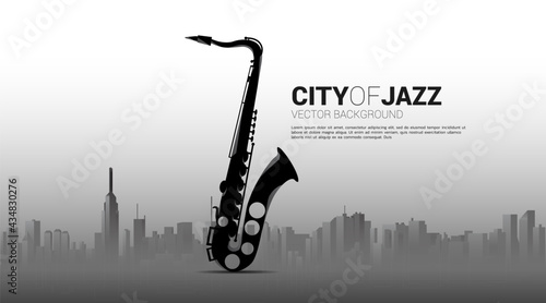 Vector silhouette of saxophone with city background. Concept for city of jazz music.