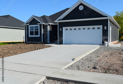 New Home Driveway Construction with a Concrete Cement Foundation by Builders for a Smooth Surface