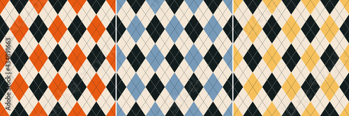 Argyle pattern set in black, blue, orange, yellow, beige. Seamless geometric stitched vector backgrounds for wallpaper, socks, sweater, gift paper, other modern spring autumn fashion textile design.
