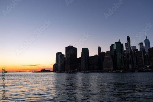 Dark Lower Manhattan Skyline after a Sunset along the East River in New York City