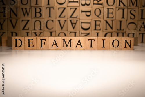 The word defamation end was created from wooden cubes. Countries and politics
