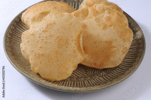 fried poori or puri made from wheat flour. Indian traditional food