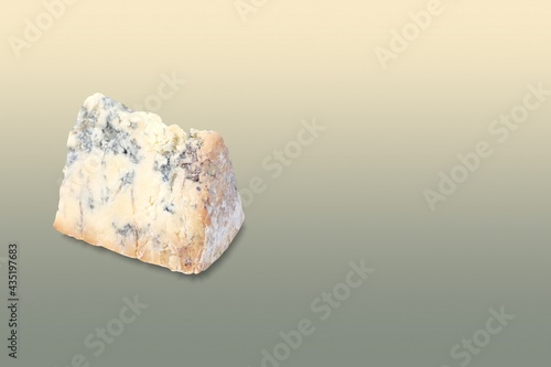 stilton cheese over matching colour background