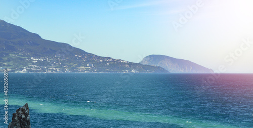 The sea coast of the Crimea, in the background is the famous mountain Ayu dag Bear Mountain