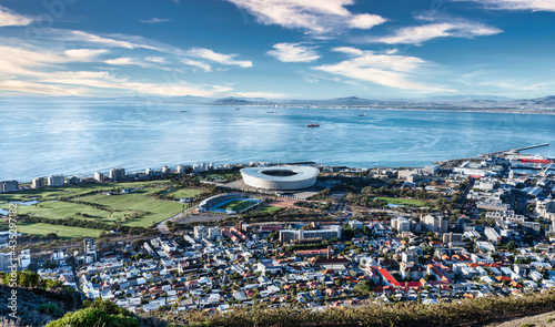 Cape Town view from Signal Hill over Atlantic Ocean. Views of Sea Point, with Cape Town Stadium in the foreground - Great outdoors adventure and travel holiday destination, Cape Town, South Africa
