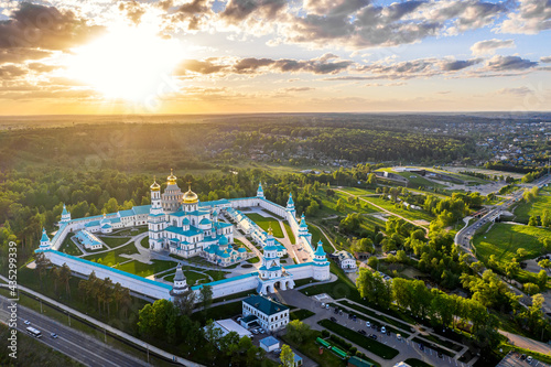 Aerial drone sunset view of the Resurrection Cathedral of the New Jerusalem Monastery in summer. Moscow region, Istra, Russia.