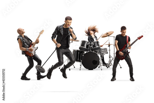 Music band with a male singer jumping with a microphone