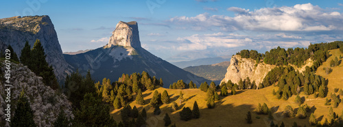 Mont Aiguille and The Vercors High Plateaus in Autumn at sunset (panoramic). Vercors Regional Natural Park in Isere (Rhone-Alpes), French Alps, France