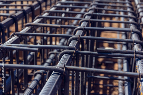 Close up view of reinforcement of concrete Construction rebar steel work reinforcement at a construction site. Steel bar construction for concreting