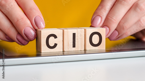 the word cio is written on wooden cubes, concept