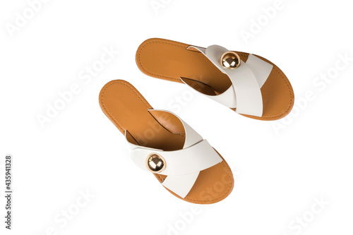 Top view of stylish summer women's sandals isolated on a white background.