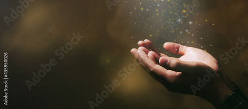 Human hands open palm up worship with faith in religion and belief in God on blessing background.Christian Religion concept background.