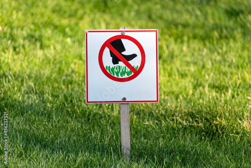 Sign Do not step on grass. Prohibition sign on the lawn. Sign prohibiting walking on the grass