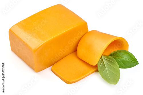 Piece of Cheddar cheese, isolated on white background. High resolution image.
