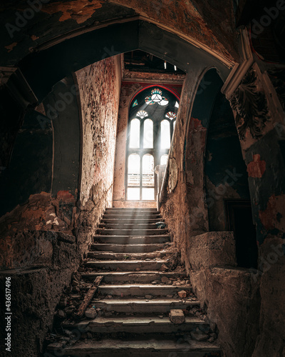 Light coming through a huge window in the haunted Spicer castle in Serbia