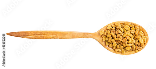 top view of wood spoon with fenugreek seeds