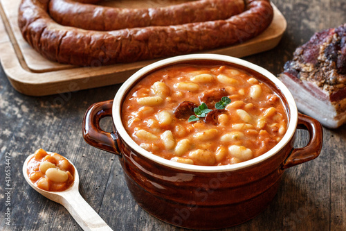 Homemade baked beans with sausage and bacon