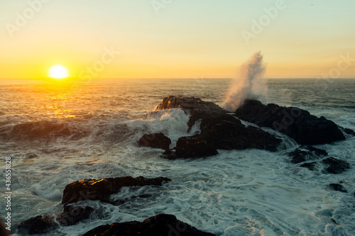 Atlantic coast ocean surf during sunset, Portugal.