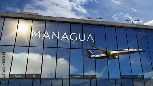 Airplane landing at Managua Nicaragua airport mirrored in terminal