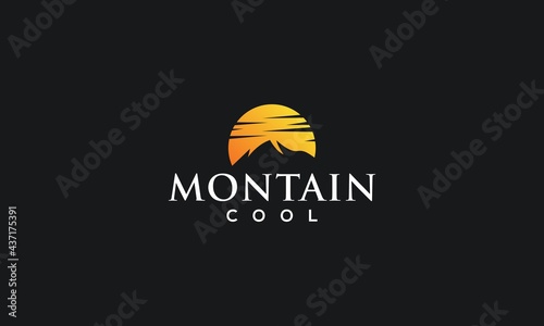 mountain logo design with black background and bright golden yellow logo