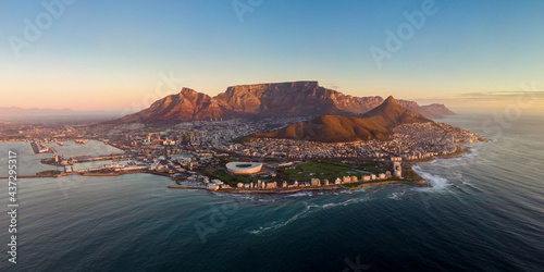 Aerial panoramic view of Cape Town cityscape at sunset, Western Cape Province, South Africa.