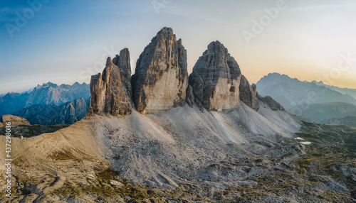 Panoramic aerial view of Tre Cime in the Dolomites Alps, National Nature Park at sunset. Italy, Europe