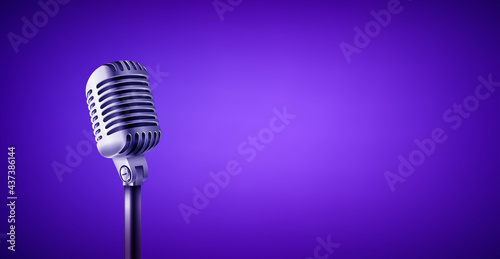 Vintage style microphone in studio. Vivid color banner with copy space