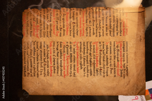 Manuscript fragment from a leaf written in medieval times on vellum or parchment. These fragments and leaves are taken from the bindings of books and were used as waste pieces. 