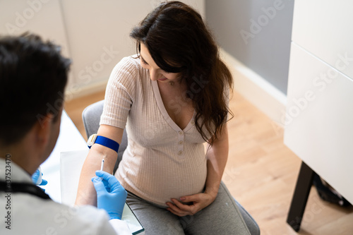 Prenatal Screening. Doctor Drawing Blood Sample