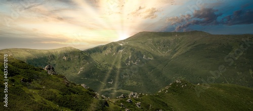 Panorama of Carpathians mountain range at summer morning. Beauty of wild virgin Ukrainian nature. Peacefulness.