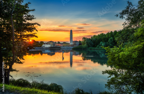 The Sile river at sunset, on the background the Casier harbour and church. photo taken on the restera walkway.