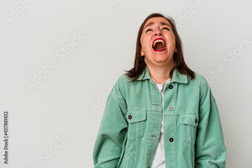 Middle age caucasian woman isolated on white background shouting very angry, rage concept, frustrated.