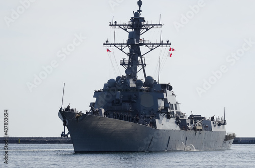 WARSHIP - Guided missile destroyer is maneuvering in the port