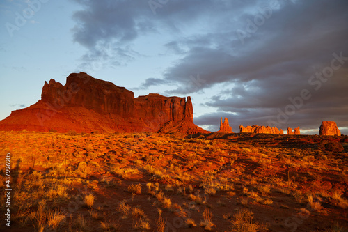 Monument Valley is a plateau on the Colorado Plateau on the southern border of the U.S. state of Utah and in northern Arizona, and is located within the Navajo Nation Reservation. Sun set.