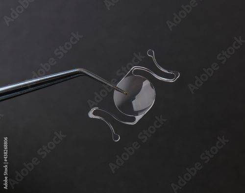 closeup photo of elastic intra ocular lens for cataract surgery